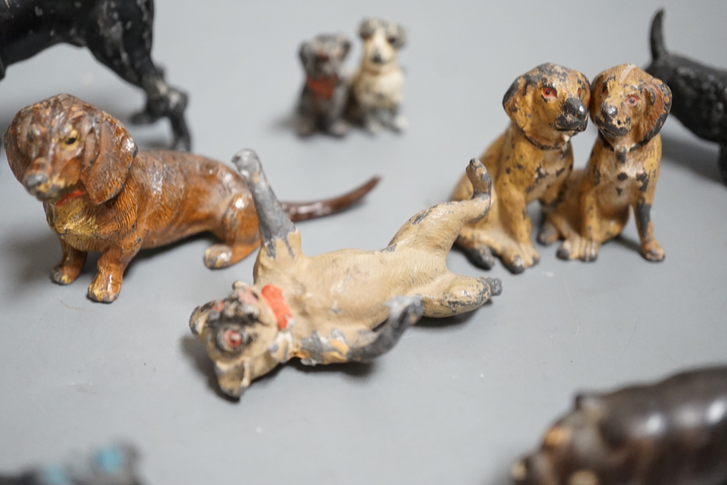 A small collection painted cast metal figures, dogs, to include ‘dancing dogs’, (group)